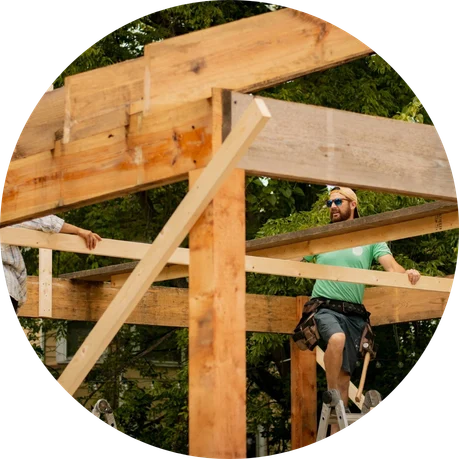 Timberline Build Co. constructing a wooden structure, likely in Orange County.